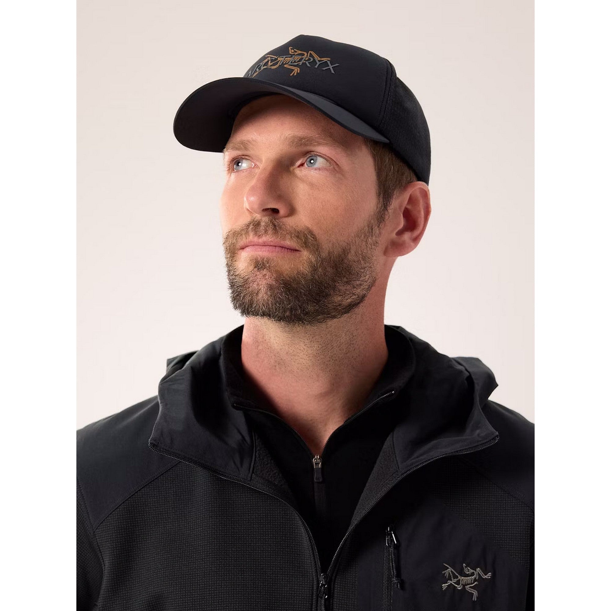 F25-X000009488-Bird-Word-Trucker-Hat-24K-Black-Hover.jpg
