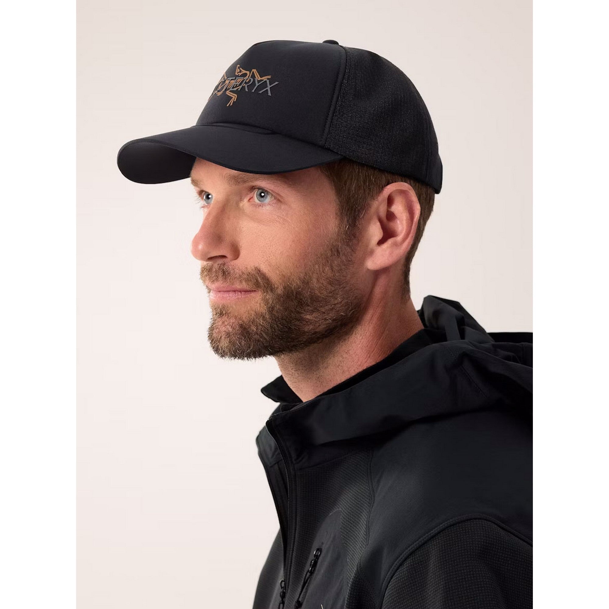 F25-X000009488-Bird-Word-Trucker-Hat-24K-Black-Side-View.jpg